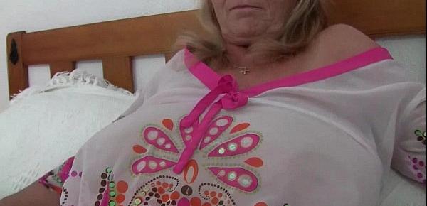  British and big boobed grandma Isabel rubs her old clit